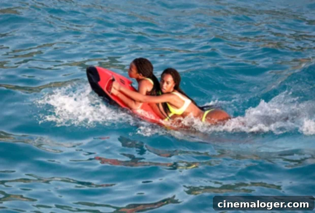 Diddy's 16-Year-Old Twins Live It Up in St Barts: Yacht Day Selfies & Tubing Thrills 3 Jessie and D'Lila Combs swimming during their St. Barts vacation