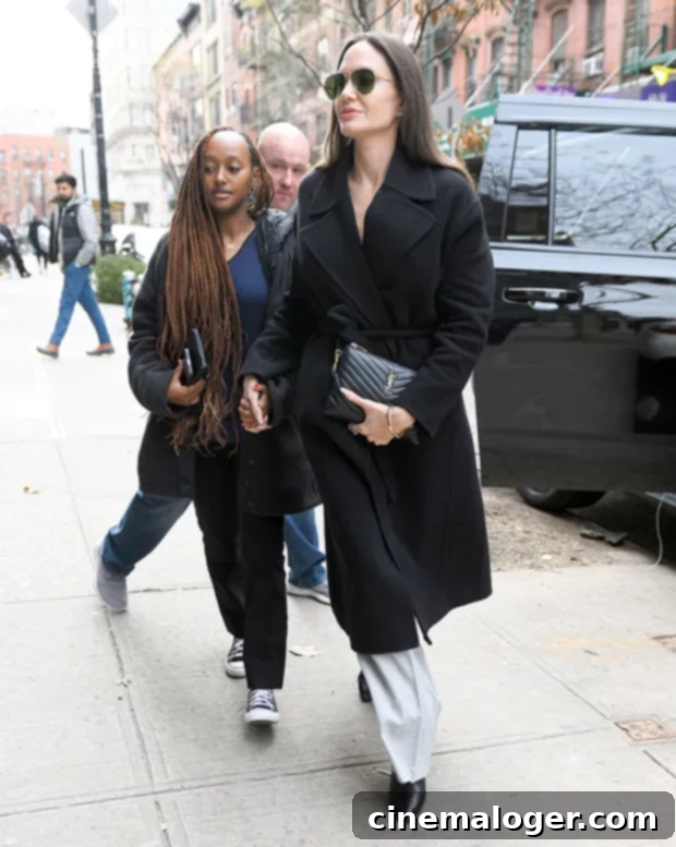 Angelina Jolie and Daughter Zahara, 18, Hit NYC Stores Ahead of School Return 3 Angelina Jolie and Zahara looked super chic while out in the Big Apple in Jan. 2023.
