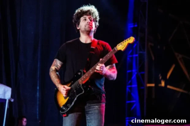 Joe Trohman Leaves Fall Out Boy Temporarily for Mental Health All You Need To Know 2 Joe Trohman performing live