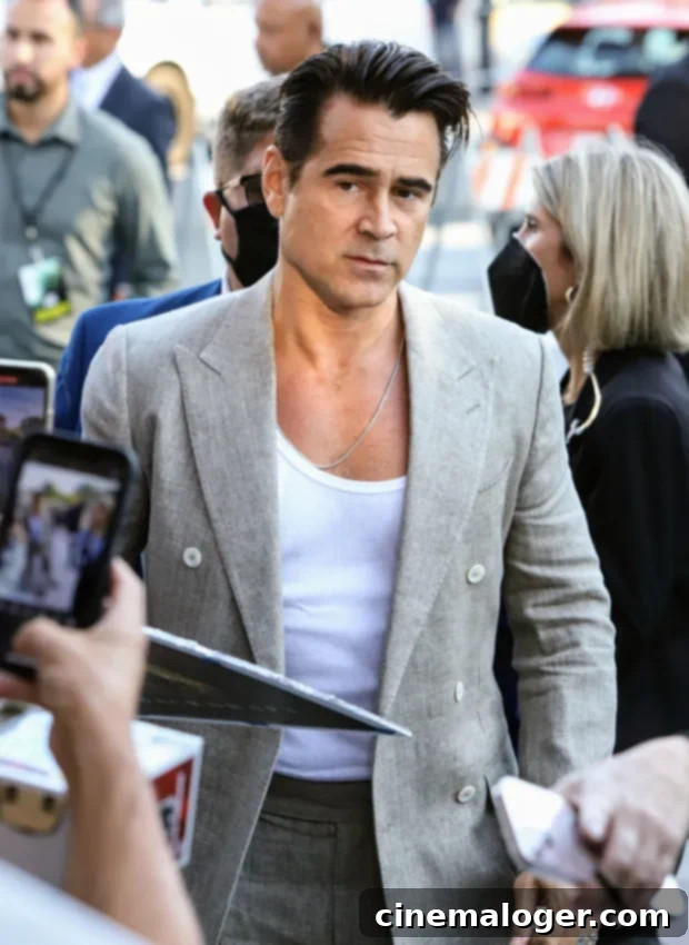 Colin Farrell’s Love Life: A Complete History of His Girlfriends 2 Colin Farrell with a serious expression, looking at the camera.