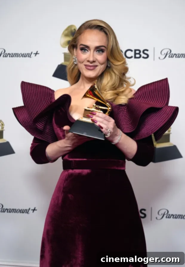 Adele Grammy Tally A Complete List of Her Awards 2 Adele at an event, captured in a candid moment.