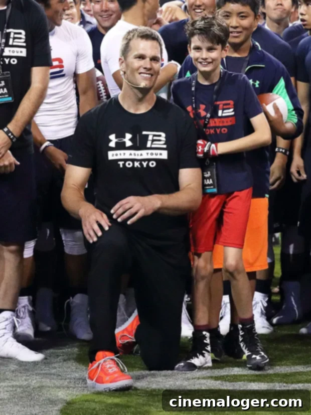 Tom Brady's Son Jack, 15, Is His Spitting Image on Ski Vacation 2 Tom Brady at a public event, dressed formally.