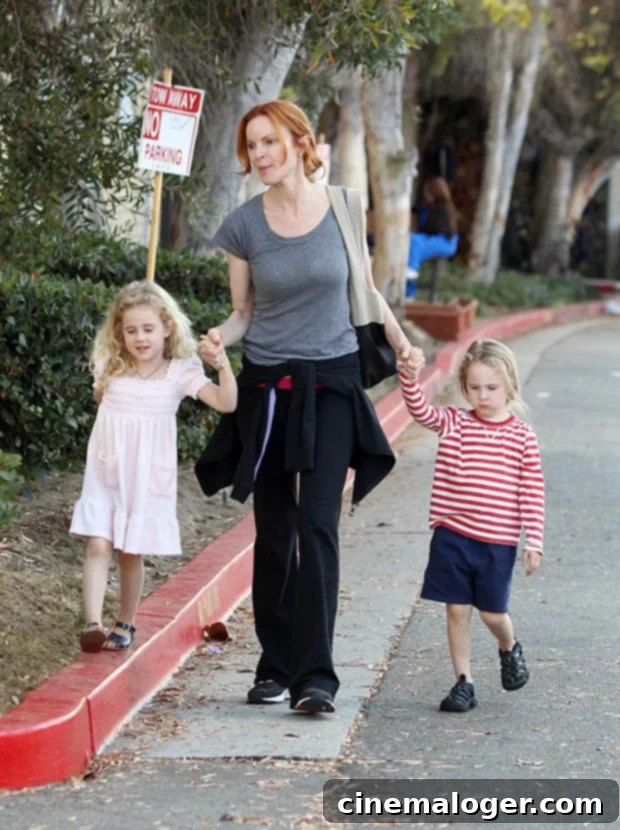 Meet Marcia Cross' Daughters Savannah and Eden 3 Marcia Cross with her twin daughters Savannah and Eden