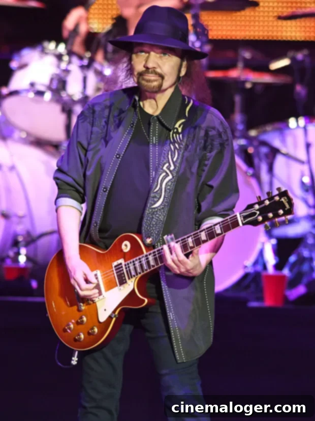 Gary Rossington The Last Chord of a Lynyrd Skynyrd Legacy 2 Gary Rossington, a founding member of Lynyrd Skynyrd and its last original member, performs on stage.