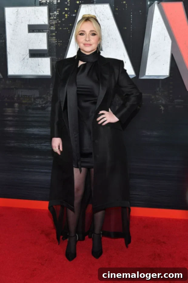 Hayden Panettiere at the Scream 6 premiere, showcasing her elegant black ensemble.