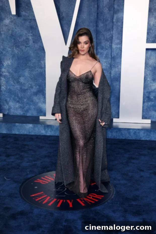Hailee Steinfeld Dazzles in Sheer Slip Dress at Vanity Fair Oscar Party 3 Hailee Steinfeld posing at the Vanity Fair Oscar Party