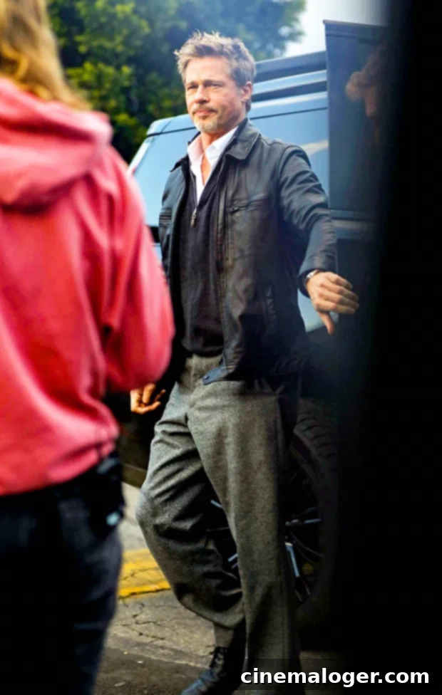 Brad Pitt and George Clooney Smolder in Leather on Movie Set 2 brad pitt wolves