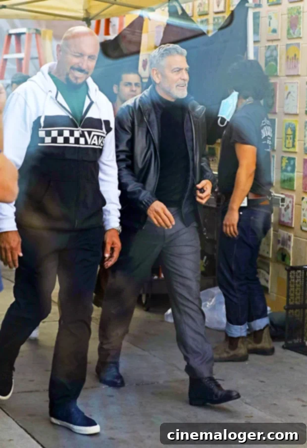 Brad Pitt and George Clooney Smolder in Leather on Movie Set 3 george clooney wolves