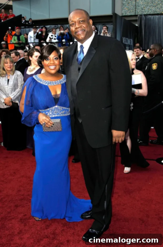 Beyond The Talk: Sherri Shepherd's Ex-Husbands Revealed 3 Sherri Shepherd and Lamar Sally smiling and embracing.