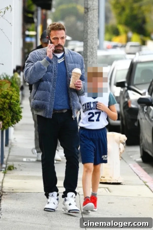 Ben Affleck Abandons Dunkin For Starbucks With Son Samuel 2 Ben Affleck and son Samuel walking with Starbucks drinks