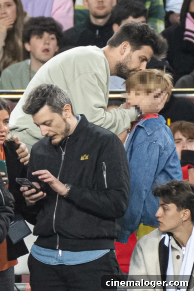 Shakira's Ex Gerard Pique Hugs Son at Barcelona Game After Finally Addressing Split 2 Gerard Pique with his sons Milan and Sasha at the Kings League final, emphasizing his commitment to family amidst public life.
