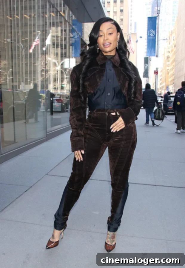 Blac Chyna Flaunts Transformed Body After Silicone Removal and 10 Lbs. Weight Loss 2 Angela White (Blac Chyna) smiling in New York City after transformation