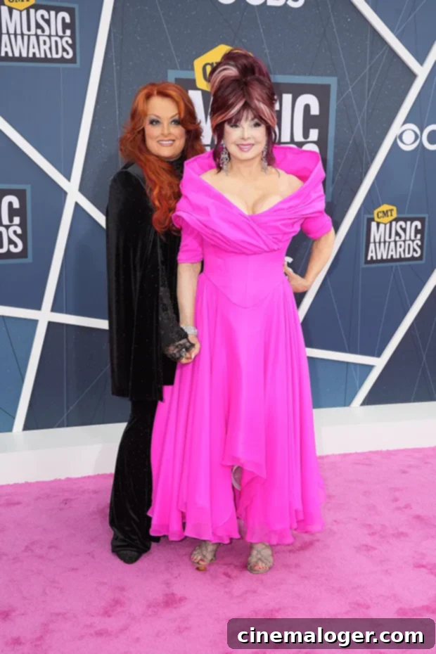 Naomi and Wynonna Judd share a loving moment at the 2022 CMT Music Awards, their last public performance together.
