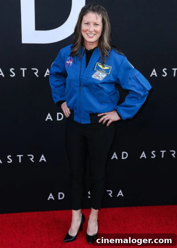 Tracy Dyson: Behind the NASA Astronaut's NCAA Anthem Moment 2 Tracy Caldwell Dyson, NASA chemist and astronaut, poses for a portrait, highlighting her impressive career in space exploration and scientific research.