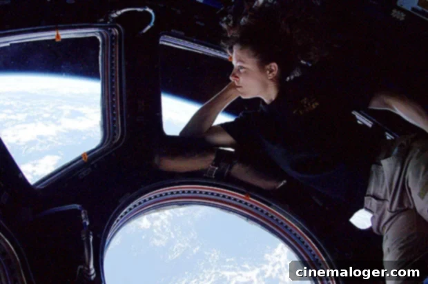 Tracy Dyson: Behind the NASA Astronaut's NCAA Anthem Moment 3 Astronaut Tracy Caldwell Dyson in space, demonstrating her dedication to scientific exploration and human spaceflight.