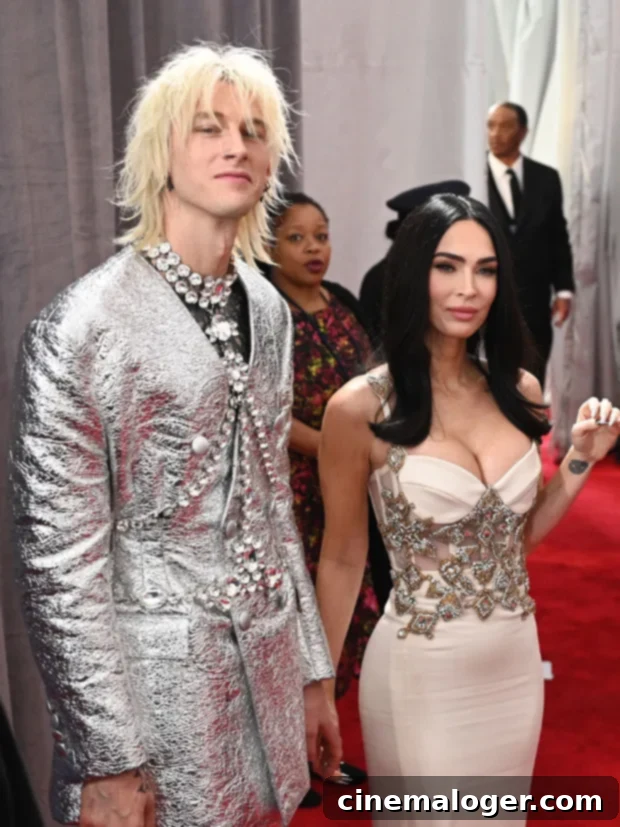 Megan Fox And MGK Silence Split Rumors With Hawaiian Getaway 3 Megan Fox and MGK walking the red carpet at the Grammys