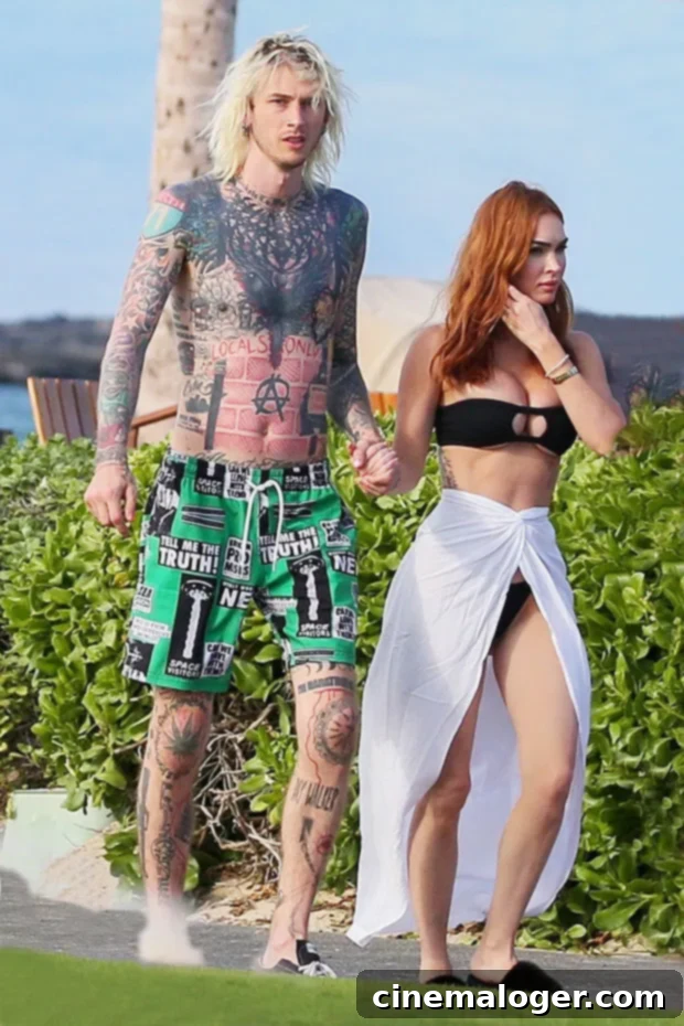 Island Romance Rekindled Megan Fox and MGK's Hawaii Hand-Holding 2 Megan Fox and Machine Gun Kelly holding hands in Hawaii, confirming their reunion.