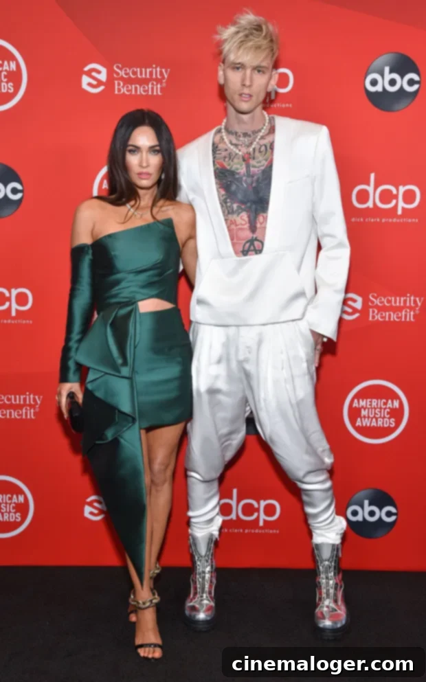Island Romance Rekindled Megan Fox and MGK's Hawaii Hand-Holding 4 Megan Fox and Machine Gun Kelly having dinner in Hawaii.
