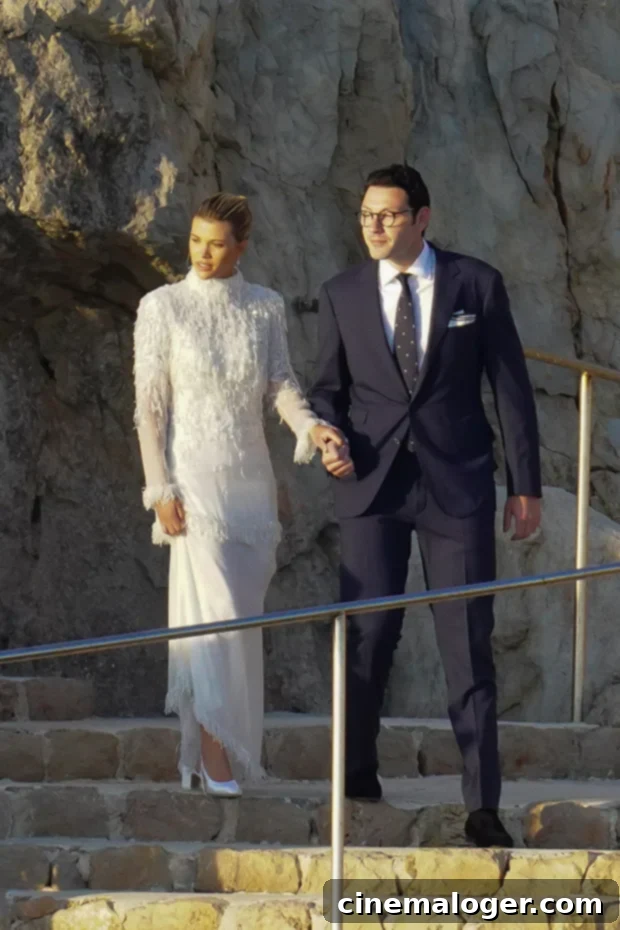 Lionel Richie's Daughter Sofia Weds Elliot Grainge in France 3 Blushing bride Sofia Richie looks radiant in an elegant white gown at her lavish wedding weekend in the French Riviera.