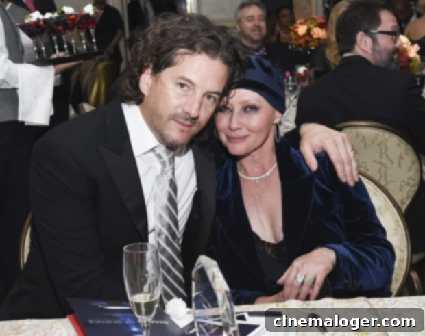 Shannen Doherty's Love Story: Her Three Marriages Explored 2 Shannen Doherty and Kurt Iswarienko at American Cancer Society's Giants of Science Los Angeles Gala in 2016.