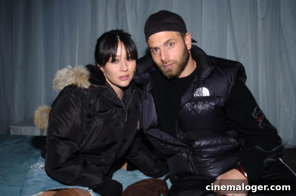 Shannen Doherty's Love Story: Her Three Marriages Explored 3 Shannen Doherty and Rick Salomon at an event.