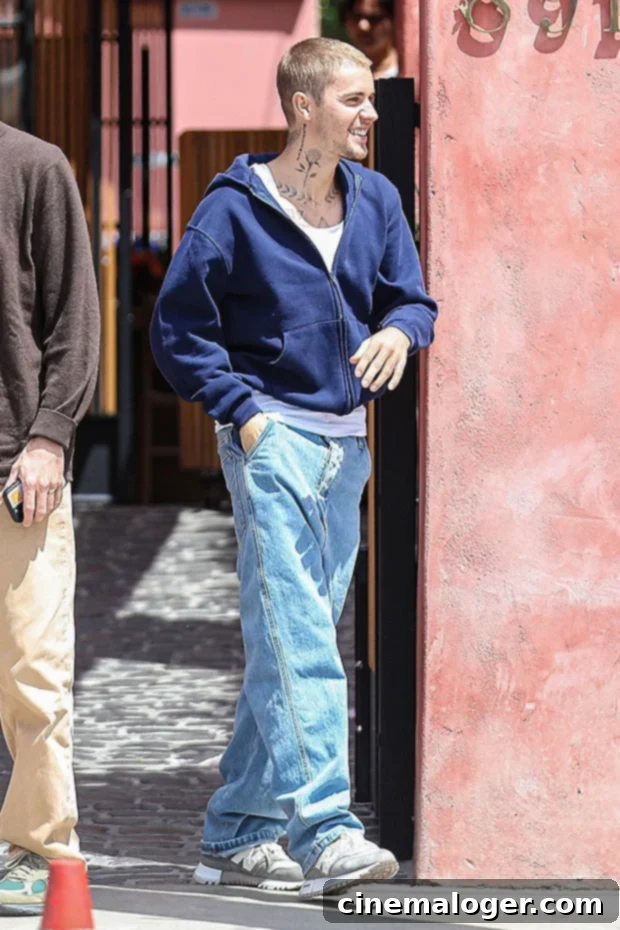 Justin Bieber Rocks His Tattoos In Tank Top & Baggy Jeans During LA Outing 2 Justin Bieber