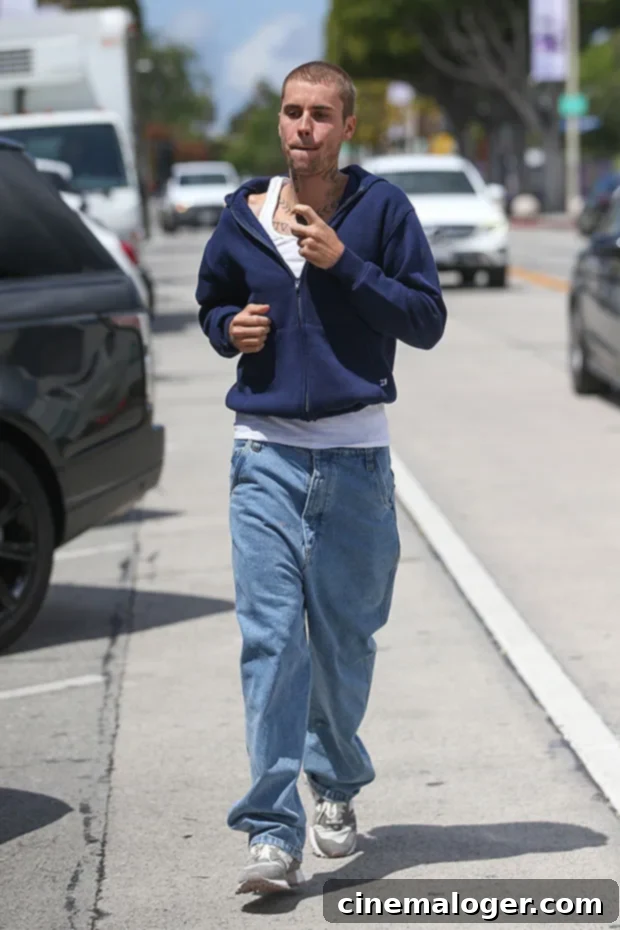 Justin Bieber Rocks His Tattoos In Tank Top & Baggy Jeans During LA Outing 3 Justin Bieber
