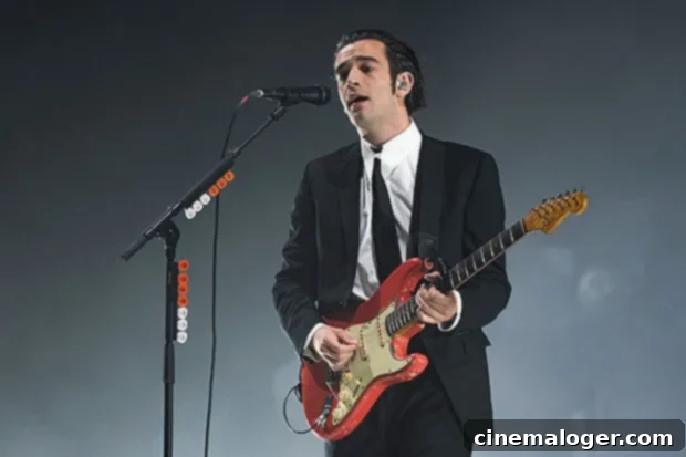 Matt Healy Shares Heartfelt Moment at Taylor Swift's Nashville Gig Alongside Gigi Hadid 2 Matty Healy, best known as a member of band The 1975, performing during one of their shows.