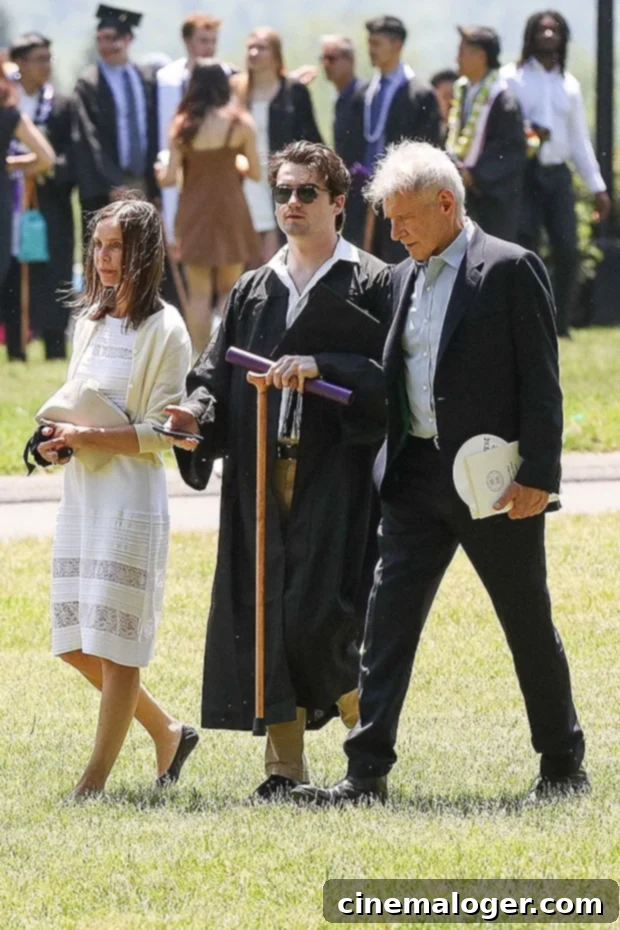 Harrison Ford and Calista Flockhart Beam With Pride as Son Liam, 22, Graduates College 2 Calista Flockhart, son Liam, and Harrison Ford at Liam’s graduation from Amherst College