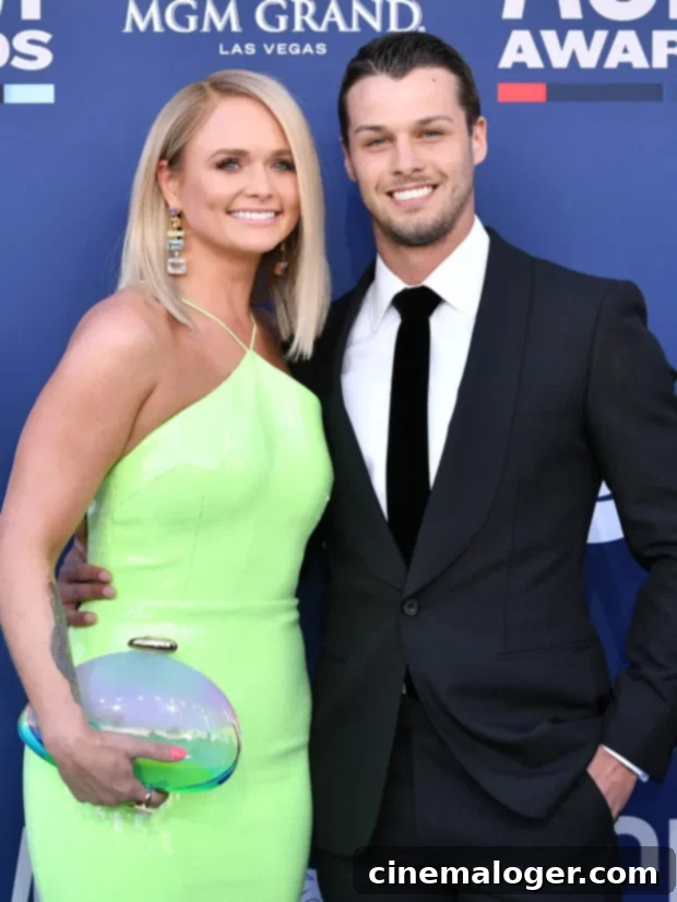 Miranda Lambert's Damn Babe Reaction to Brendan McLoughlin's Shirtless Pic 2 Miranda Lambert and Brendan McLoughlin share a loving moment at an event, with Miranda smiling brightly and Brendan looking on adoringly.