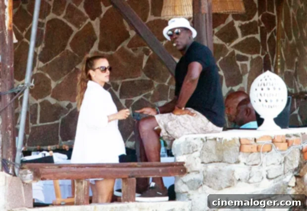 Michael Jordan Vacations With Wife After Reacting To Son Marcus' Larsa Pippen Romance 2 Michael Jordan and Yvette Prieto enjoy a romantic vacation in Italy, captured during their Lipari Islands getaway.