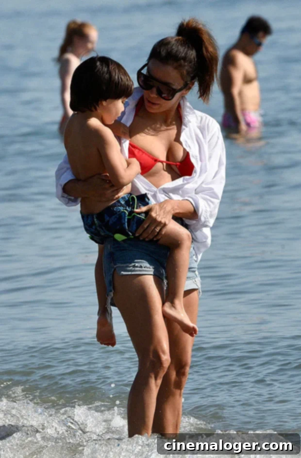 Eva Longoria Sizzles in Daisy Dukes and Bikini During Spanish Trip with Son Santiago 3 Eva Longoria and son Santiago in Spain