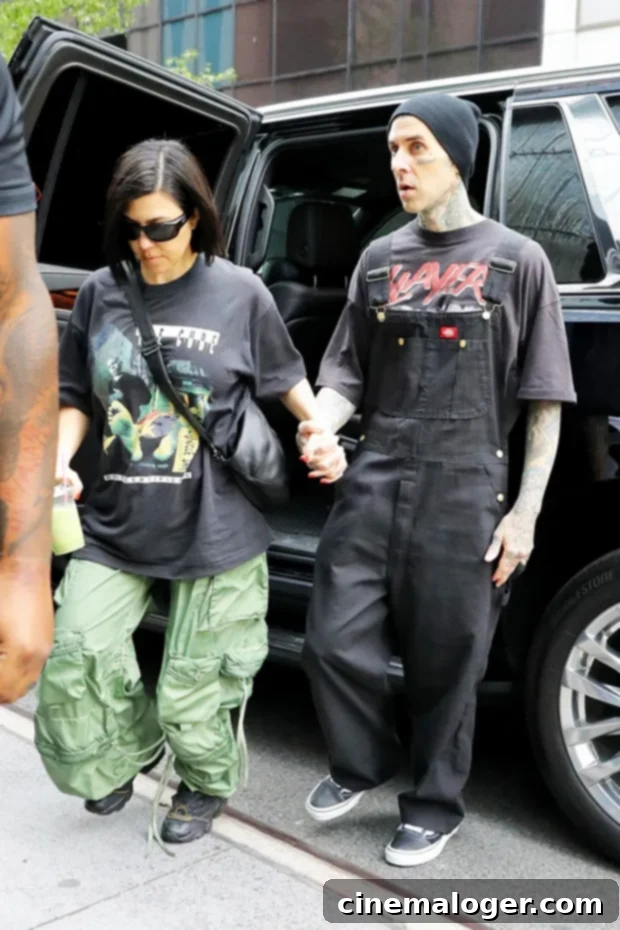 Father Son Goals Travis Barker And His Baby Boy Match Jerseys 2 Kourtney Kardashian and Travis Barker share a tender moment.