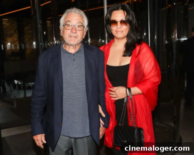 Robert De Niro Says Tiffany Chen Takes the Lead Raising Daughter Gia 2 Robert De Niro and Tiffany Chen walking in NYC
