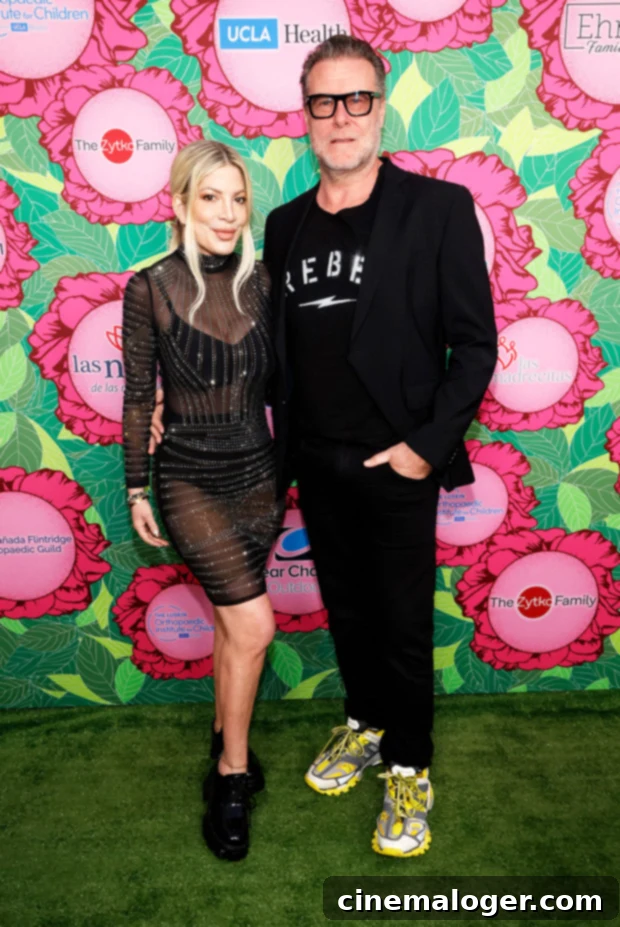 Dean McDermott: Tori Spelling's New Relationship Is An Attention Play 2 Tori Spelling and Dean McDermott, a celebrity couple navigating post-divorce life and new relationships.