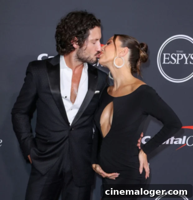 Val Chmerkovskiy and Jenna Johnson's Evolving Love: From Ballroom to Baby 5 Jenna Johnson holding her baby boy Rome Valentin