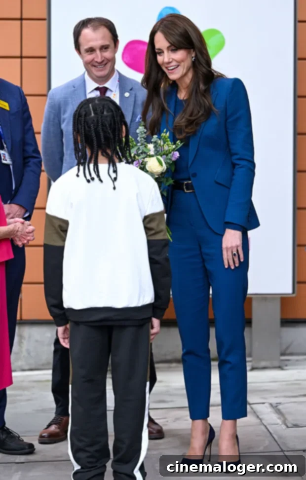 Kate Middleton's Stunning Navy Pantsuit Charms During Children's Hospital Tour 2 Kate Middleton Rocks Navy Blue Pantsuit During Hospital Visit: Photos