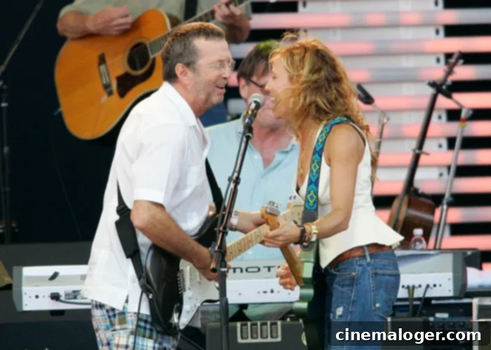 Sheryl Crow's Love Life: From Rock Legends to Sports Icons 2 Eric Clapton and Sheryl Crow performing on stage