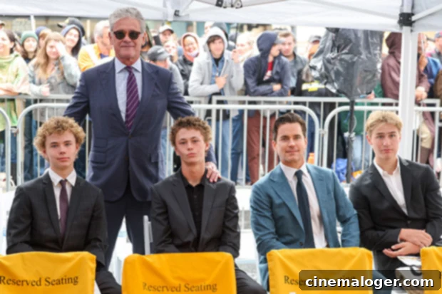 Inside Matt Bomer's Marriage: A Look at the 'Fellow Travelers' Star's Spouse 3 Matt Bomer and Simon Halls smiling with their three sons, who are also smiling, on the Hollywood Walk of Fame. The sons are of varying ages.