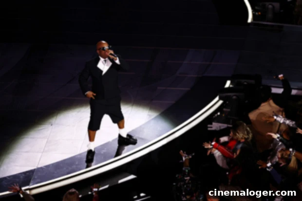 Jermaine Dupri's Super Bowl Socks Go Viral, He Thinks It's Hilarious 3 Jermaine Dupri performing at the Super Bowl Halftime Show in his viral Louis Vuitton socks and black loafers.