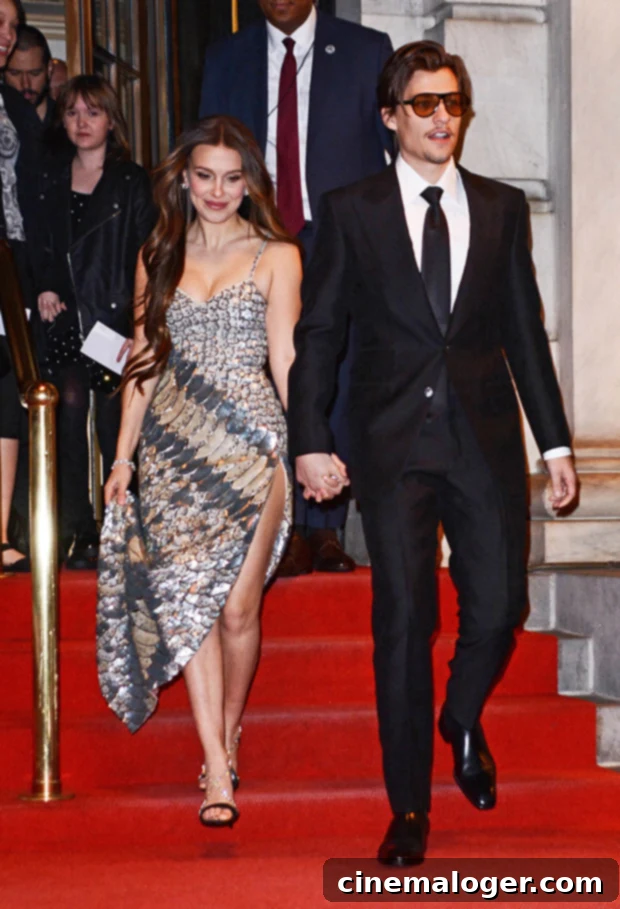 Jon Bon Jovi Gushes Over Daughter-In-Law Millie Bobby Brown's 'Gorgeous' Wedding Day 2 Jon Bon Jovi, rock icon and proud father, beams while discussing his son Jake Bongiovi's wedding to Millie Bobby Brown on a TV show.