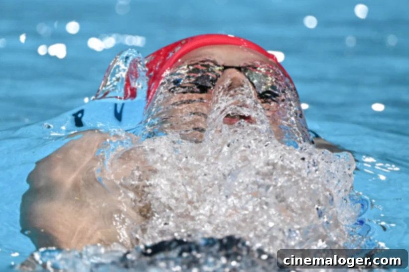 Greenbank DQ: The Unexpected Rule Break 2 Britain's Luke Greenbank competes in a heat of the men's 200m backstroke swimming event during the Paris 2024 Olympic Games at the Paris La Defense Arena in Nanterre, west of Paris, on July 31, 2024. (Photo by Jonathan NACKSTRAND / AFP) (Photo by JONATHAN NACKSTRAND/AFP via Getty Images)