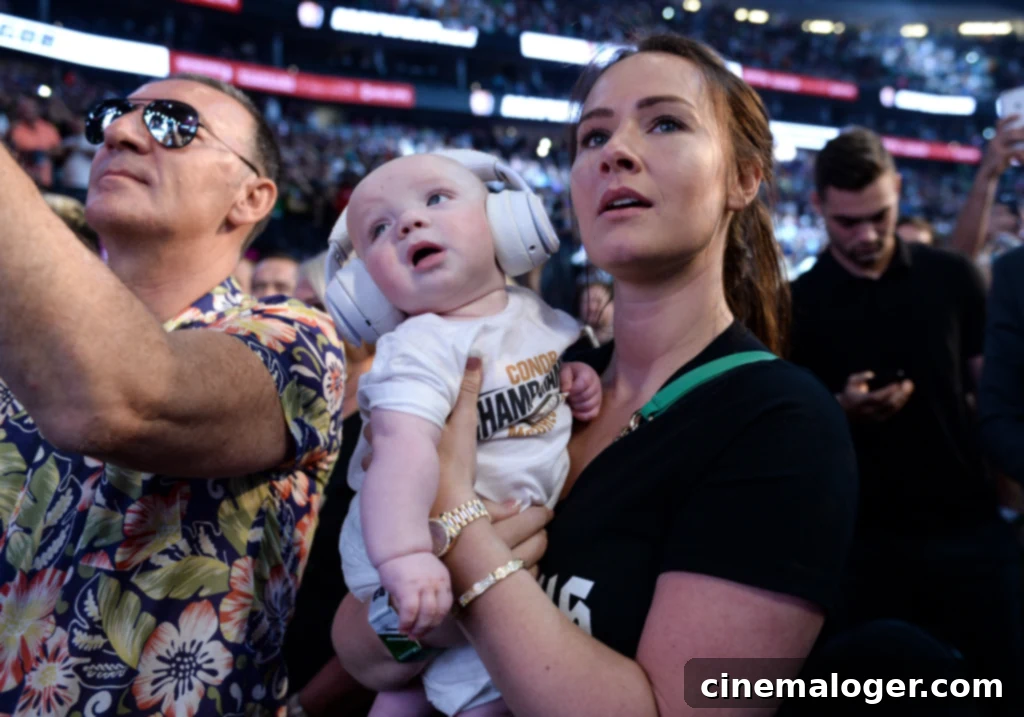 Conor McGregor Children Everything You Need To Know 2 LAS VEGAS, NV - AUGUST 25: Dee Devlin holds Conor McGregor Jr. and watches as Conor McGregor pose on the scale during his official weigh-in at T-Mobile Arena on August 25, 2017 in Las Vegas, Nevada. McGregor will meet boxer Floyd Mayweather Jr. in a super welterweight boxing match at T-Mobile Arena on August 26. (Photo by Brandon Magnus/Zuffa LLC/Zuffa LLC via Getty Images)
