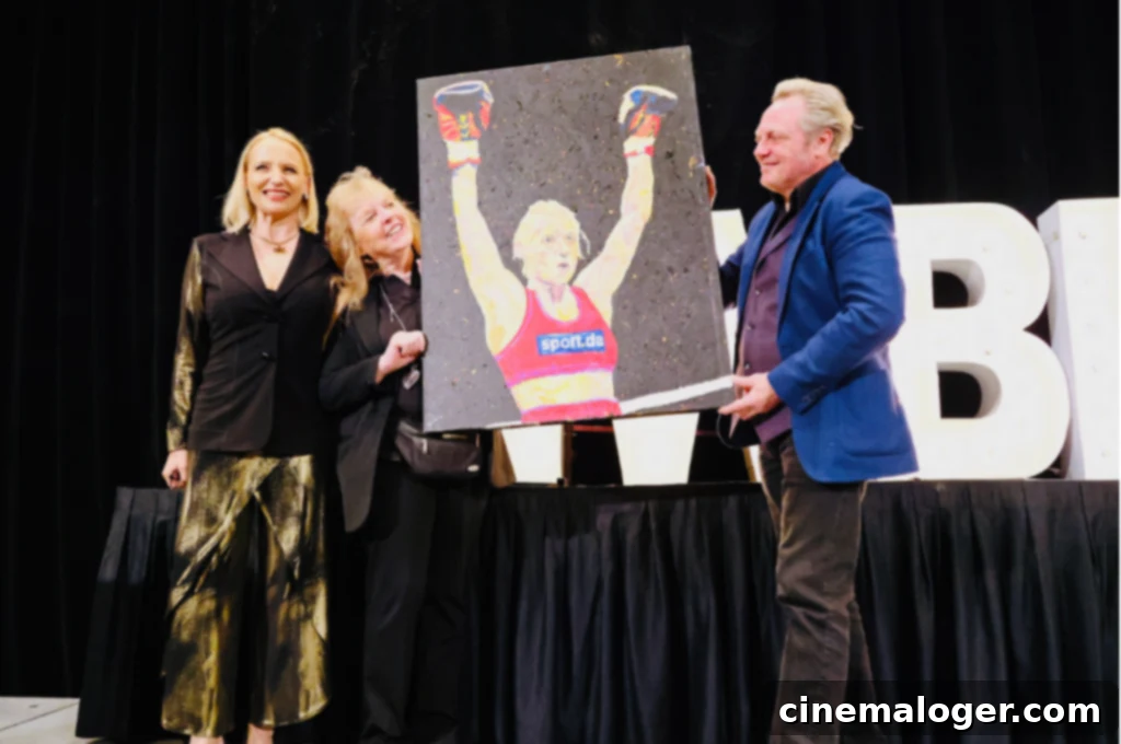 Saluting Women's Boxing Greats 2 Victor Migalchan with World Champion Daisy Lang at the International Women's Boxing Hall of Fame