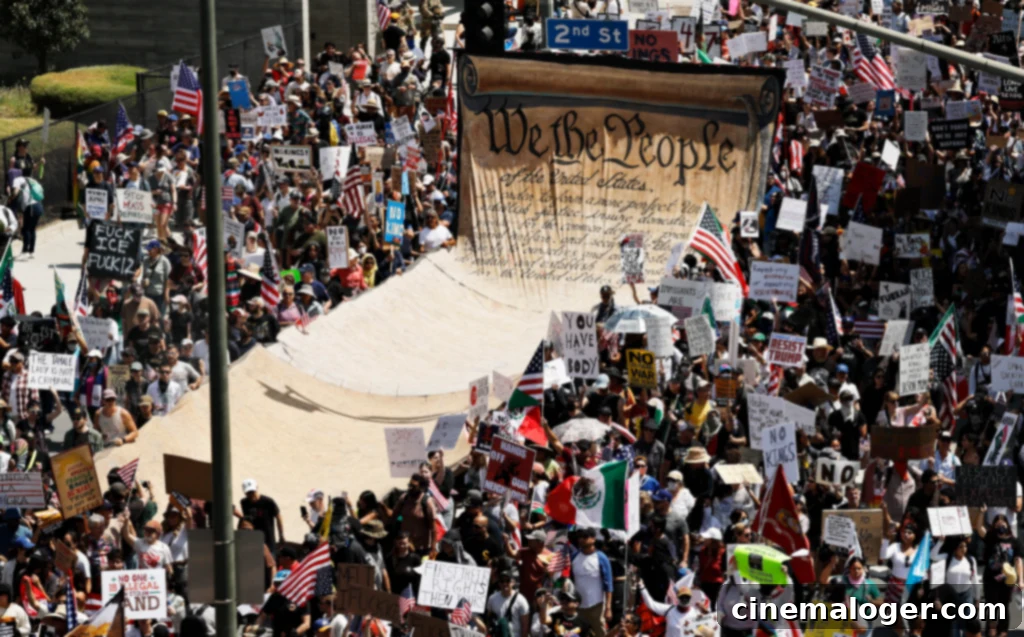 LOS ANGELES, CALIFORNIA - JUNE 14: Protesters carry a banner representing the Preamble to the U.S. Constitution in downtown Los Angeles during an anti-Trump 