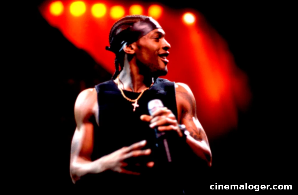 D'Angelo's Children: Meet His Kids With Angie Stone and Other Partners 2 Singer D'Angelo (born Michael Eugene Archer) performs on stage at the Aire Crown Theater, Chicago, Illinois, April 4, 2000. (Photo by Paul Natkin/Getty Images)