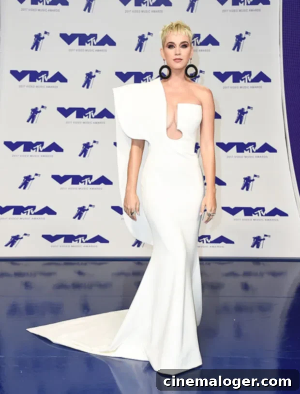 Katy Perrys 36th Birthday 24 Most Glamorous Red Carpet Looks As A New Mom 3 Katy Perry radiant in a sophisticated white gown on the red carpet at the MTV Video Music Awards.