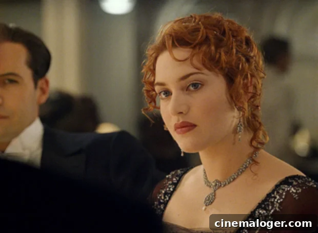 Kate Winslet Spent Two Years Restoring Her Natural Hair After Titanic's Iconic Red 2 Kate Winslet as Rose in Titanic with her striking red hair, looking thoughtful.