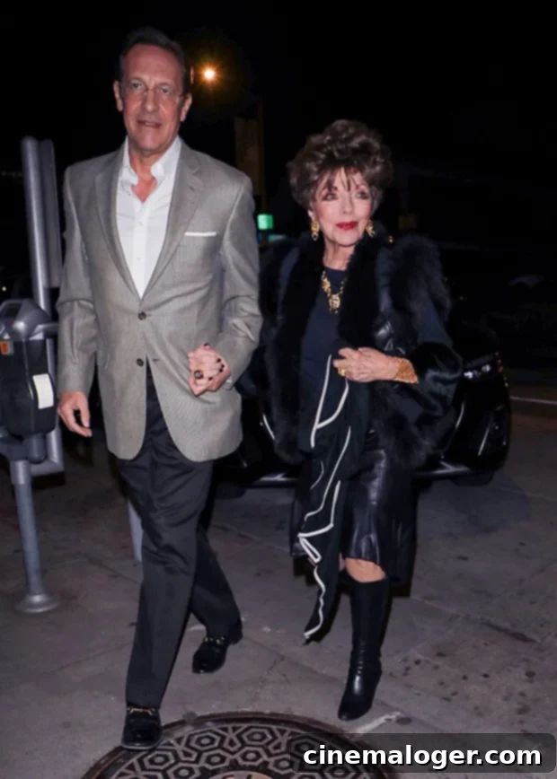 Joan Collins and Percy Gibson sharing a romantic moment during their West Hollywood date night.