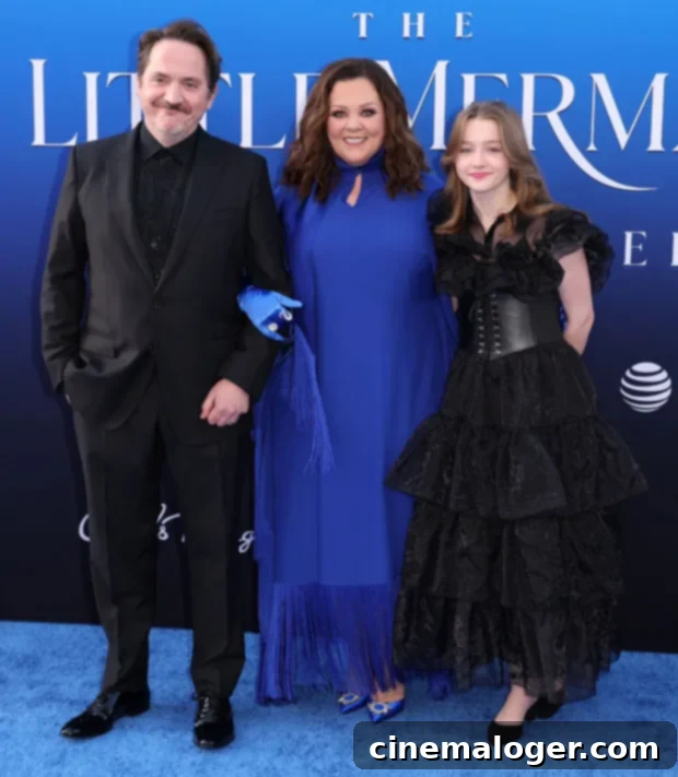Melissa McCarthy and Ben Falcone with their daughter Vivian at ‘The Little Mermaid’ premiere